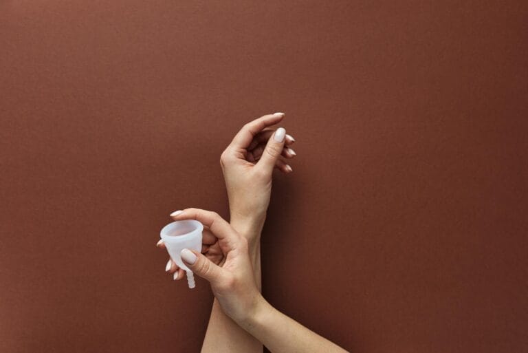 A Person Holding a Menstrual Cup